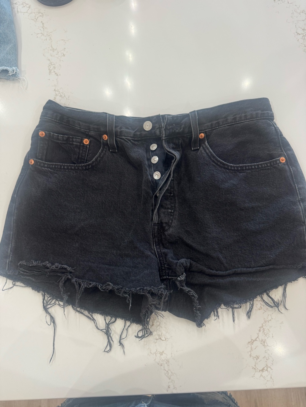High-Rise Black Denim Cutoff Shorts with Button Fly